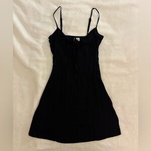 H&M tie front spaghetti strap mini dress.
Never worn